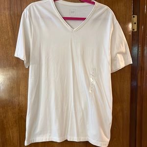 New off white men’s v neck T-shirt from the gap. Stickers still on.